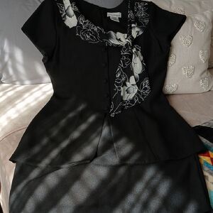 Elegant Asymmetrical Black Dress with Floral Accents